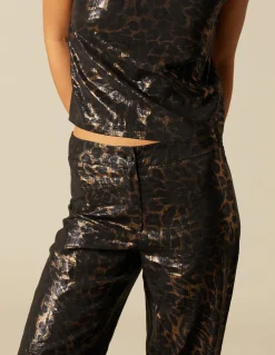 Online PANTALÓN ANIMAL PRINT BRILLO Pantalones